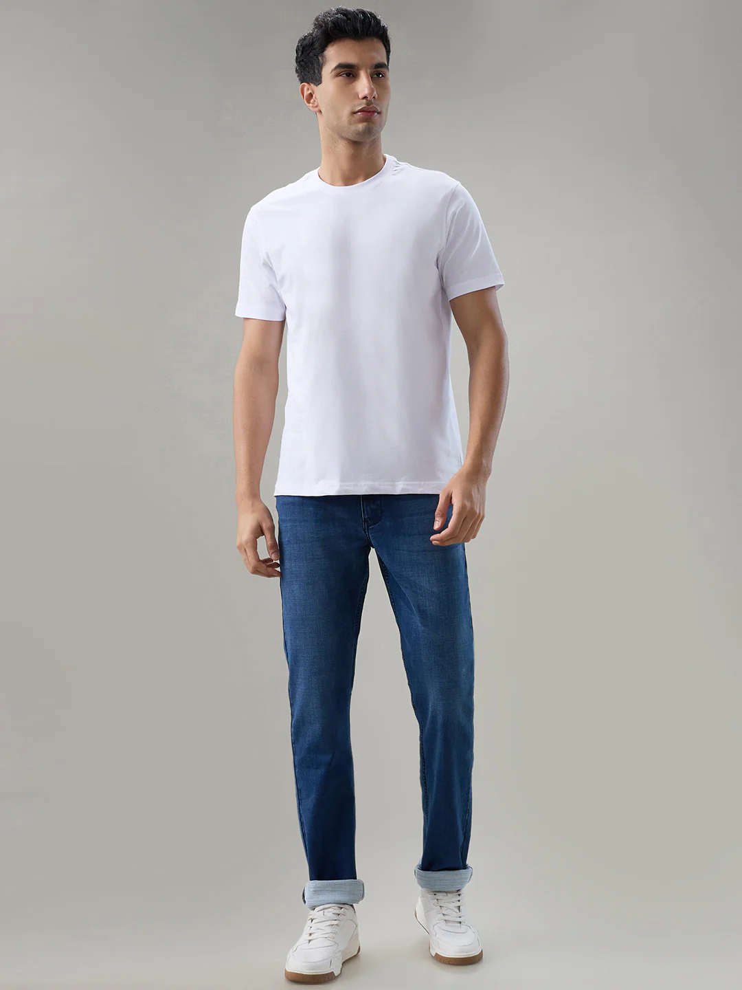 Park Avenue Men Slim Fit Solid Pattern Cotton Blend Flat Front Jeans - Image 5